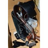 A BOX CONTAINING A REPLICA CAP GUN, a dis-assembled cap gun, a replica flintlock pistol, together
