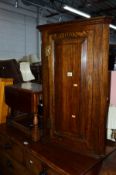 AN OAK PANELLED SINGLE DOOR CORNER CUPBOARD, and a drop leaf occasional table (key) (2)