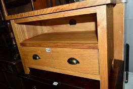 A LIGHT OAK TV CABINET, with a single long drawer