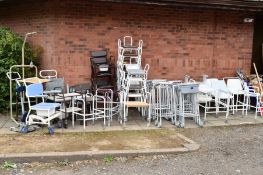 A LARGE COLLECTION OF MEDICAL EQUIPMENT, including zimmer frames, commodes, walking sticks and hoist