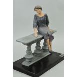 A MONTSERRAT RIBES SCULPTURE 'Elisa', woman seated on bench, on plinth with plaque, total height