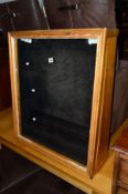 A PINE GLAZED SLANTED TABLE TOP JEWELLERY DISPLAY CASE, approximate size width 67cm x depth 79cm x