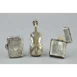 A VICTORIAN SILVER VESTA CASE OF RECTANGULAR FORM, Birmingham 1883, together with another engraved