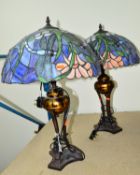 A PAIR OF MODERN TABLE LAMPS WITH TIFFANY STYLE LEADED GLASS SHADES, on metal bases (2)