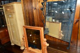AN EARLY 20TH CENTURY PINE POT CUPBOARD, pine swing mirror and a metal framed mirror (3)