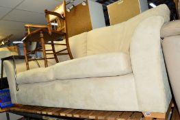 A CREAM UPHOLSTERED THREE SEATER SOFA, and a leather three seater sofa (2)