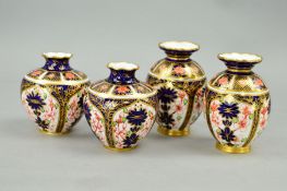 A PAIR OF SMALL ROYAL CROWN DERBY IMARI VASES, '1128' pattern, approximate height 7cm, together with
