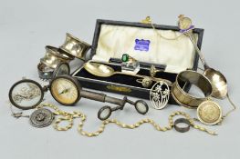 A SELECTION OF SILVERWARE AND JEWELLERY, to include four early 20th Century silver napkin rings,
