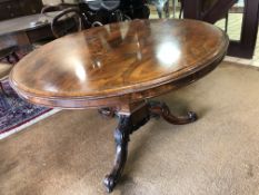 A VICTORIAN ROSEWOOD CIRCULAR BREAKFAST TABLE, on a scrolled tripod base, diameter