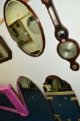AN EDWARDIAN MAHOGANY OVAL FRAMED BEVELLED EDGE WALL MIRROR, and two other decorative mirrors