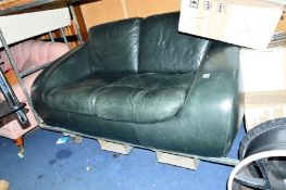 A GREEN LEATHER TWO SEATER SOFA