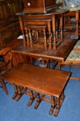 AN OLD CHARM OAK OVAL TOPPED NEST OF THREE TABLES and a similar oak coffee/nest of three tables (2)