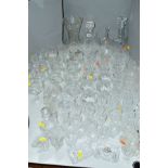 A QUANTITY OF CUT/ETCHED GLASSWARES, to include decanters, glasses, etc