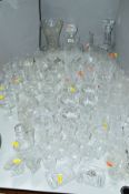 A QUANTITY OF CUT/ETCHED GLASSWARES, to include decanters, glasses, etc