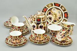 A ROYAL CROWN DERBY OLD IMARI TEASET, '1128' pattern to include teapot, cake plate, milk jug,