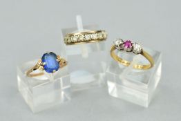 THREE GEM SET RINGS, to include an early three stone diamond and ruby ring, ring size J1/2,