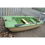 A BIC SPORT 252 FIBRE GLASS AND PLASTER DINGHY, with two oars, approximate size 246cm x 121cm