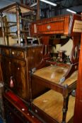 A REPRODUCTION MAHOGANY TWO DOOR CABINET, two tier occasional table, a sofa table and three