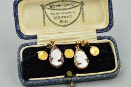 A SET OF THREE DRESS STUDS AND A PAIR OF CAMEO EARRINGS, the circular dress studs of plain design,