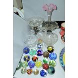 A GROUP OF COLOURED AND CLEAR GLASSWARE, including modern paperweights, single trumpet epergne, etc