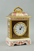 A ROYAL CROWN DERBY 'OLD IMARI' QUARTZ TIMEPIECE, '1128' pattern, gold banded, approximate height