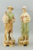 A PAIR OF ROYAL DUX STYLE FIGURES, young man with flagon of wine/ale wearing apron, No 285 and young