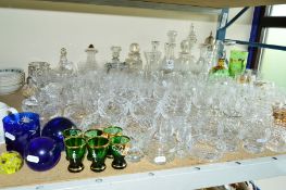 A COLLECTION OF GLASSWARE, mostly drinking glasses, decanters and vases (quantity)
