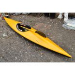A YELLOW CANOE, with double oars