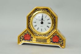 A SMALL ROYAL CROWN DERBY 'OLD IMARI' QUARTZ CLOCK, '1128' pattern, gold banded, approximate