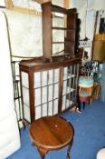 AN OAK TWO DOOR CHINA CABINET, an oak bookcase and an oak occasional table (sd) (3)