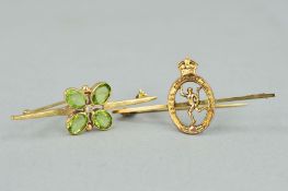 TWO MID 20TH CENTURY BAR BROOCHES, to include a 9ct peridot and diamond quatrefoil design, measuring