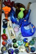 A QUANTITY OF COLOURED GLASSWARE, including modern paperweights, flower baskets, vases, Wedgwood