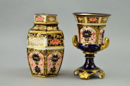 A ROYAL CROWN DERBY IMARI TWIN HANDLED URN, '1128' pattern, approximate height 12cm, together with a