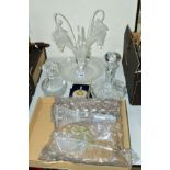 TWO GLASS DECANTERS AND STOPPERS, a clear glass epergne, central vase and one trumpet damaged and