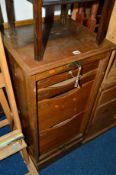 A 20TH CENTURY OAK TAMBOUR FRONT CABINET, with two deep drawers and two smaller drawers, approximate