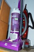 TWO HOOVER UPRIGHT VACUUM CLEANERS