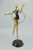 A DECO STYLE BRASS AND BRONZED FIGURE WITH A HOOP, approximate height 59cm (hoop broken and foot