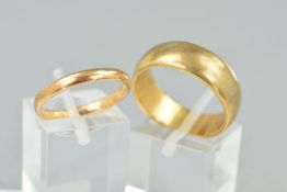 TWO WEDDING RINGS, a wide 'D' shaped band measuring approximately 7.5mm in width, plain polished