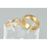 TWO WEDDING RINGS, a wide 'D' shaped band measuring approximately 7.5mm in width, plain polished