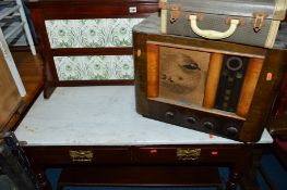 AN EDWARDIAN MAHOGANY MARBLE TOPPED WASHSTAND, with a tiled back and two drawers