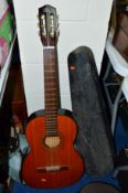 A TANTARRA ACCOUSTIC GUITAR, with carry case and a distressed violin in case (2)