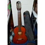 A TANTARRA ACCOUSTIC GUITAR, with carry case and a distressed violin in case (2)