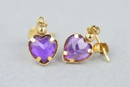 A PAIR OF AMETHYST DROP EARRINGS, each designed as a suspended heart shape amethyst within a plain