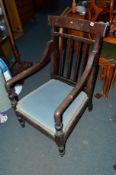 A VICTORIAN MAHOGANY ELBOW CHAIR