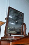 A VICTORIAN MAHOGANY SWING MIRROR, together with an ebonised overmantle mirror and two other mirrors