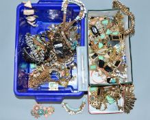 A SELECTION OF COSTUME JEWELLERY, to include necklaces, earrings, a pen, etc (many pieces are