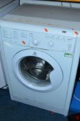 AN INDESIT 7KG WASHING MACHINE