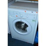 AN INDESIT 7KG WASHING MACHINE