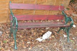 A CAST IRON SLATTED GARDEN BENCH