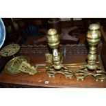 A PAIR OF LATE 19TH BRASS FIRE DOGS, a brass three piece fire irons set, brass circular tray, etc (